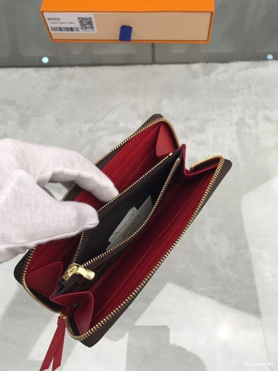 First bag VUITTON ZIPPY LOUIS 0717